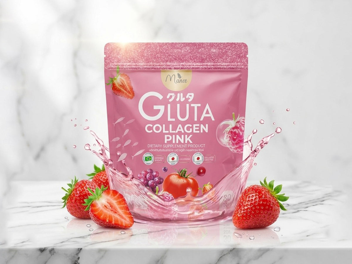A stand-up pouch of M-Maxx Gluta Collagen Pink in strawberry flavor, displayed on a white marble surface with fresh strawberries and a pink liquid splash graphic in the foreground.